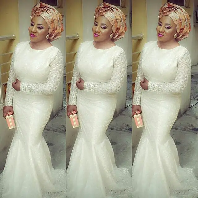 magnificent aso ebi styles in lace amillionstyles.com @mide-martins
