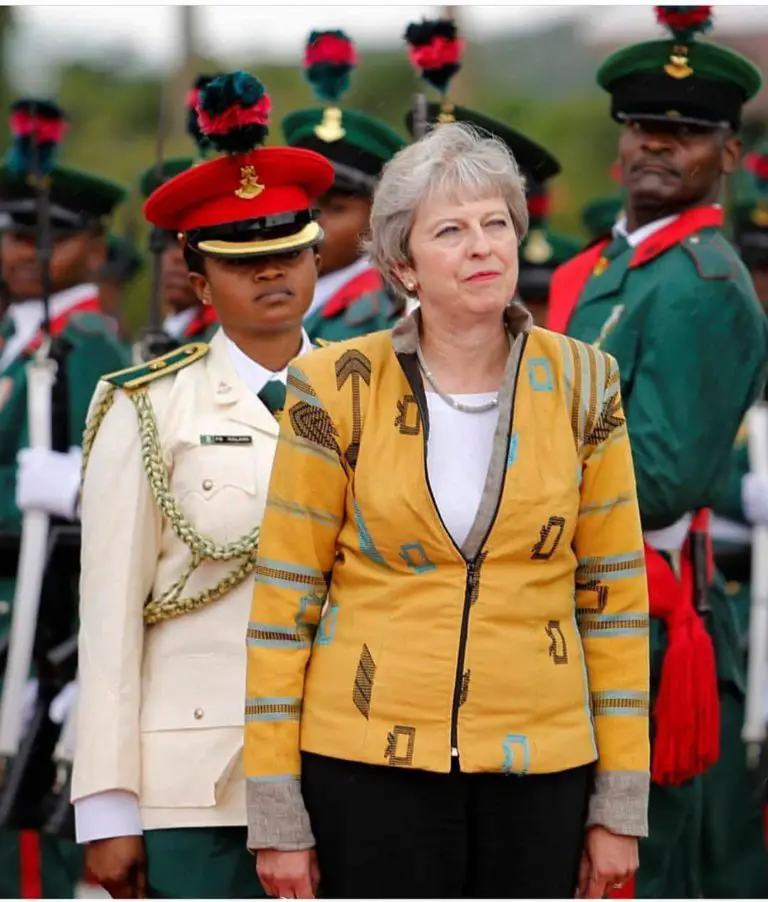 British Prime Minister Theresa May Looks Stunning Wearing Nigerian Designer Emmy Kasbit  