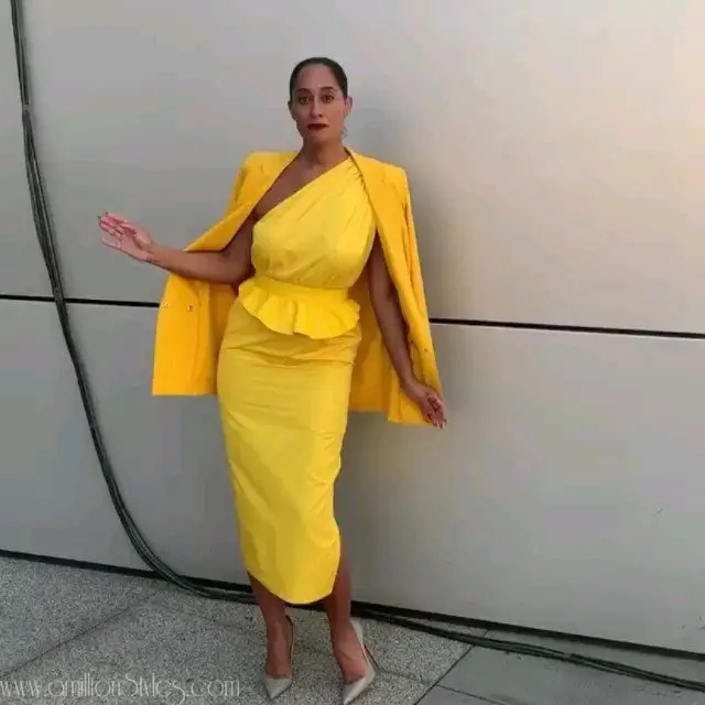 Tracee Ellis Ross In Yellow Asymmetrical Peplum Dress From Max Mara