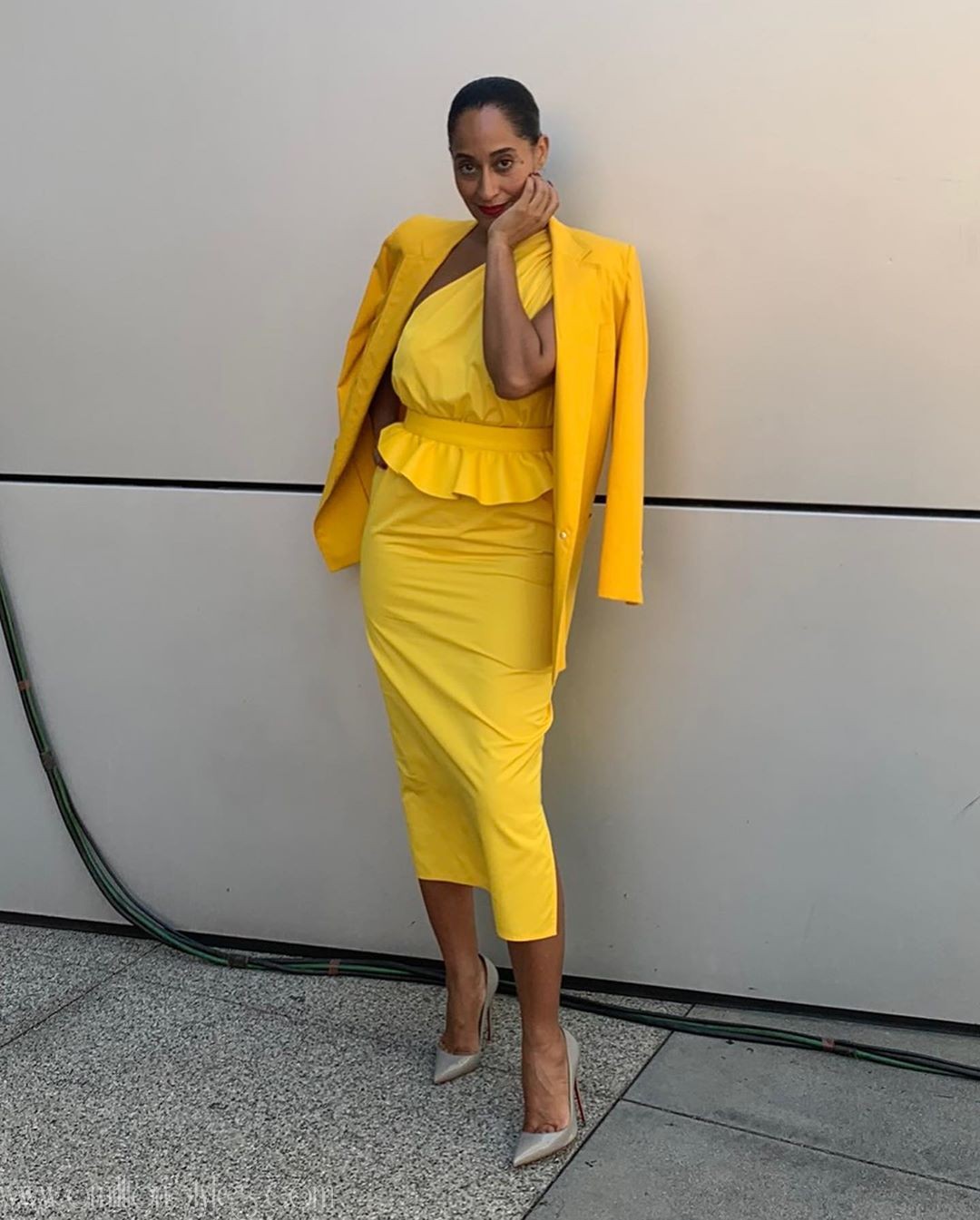 Tracee Ellis Ross In Yellow Asymmetrical Peplum Dress From Max Mara