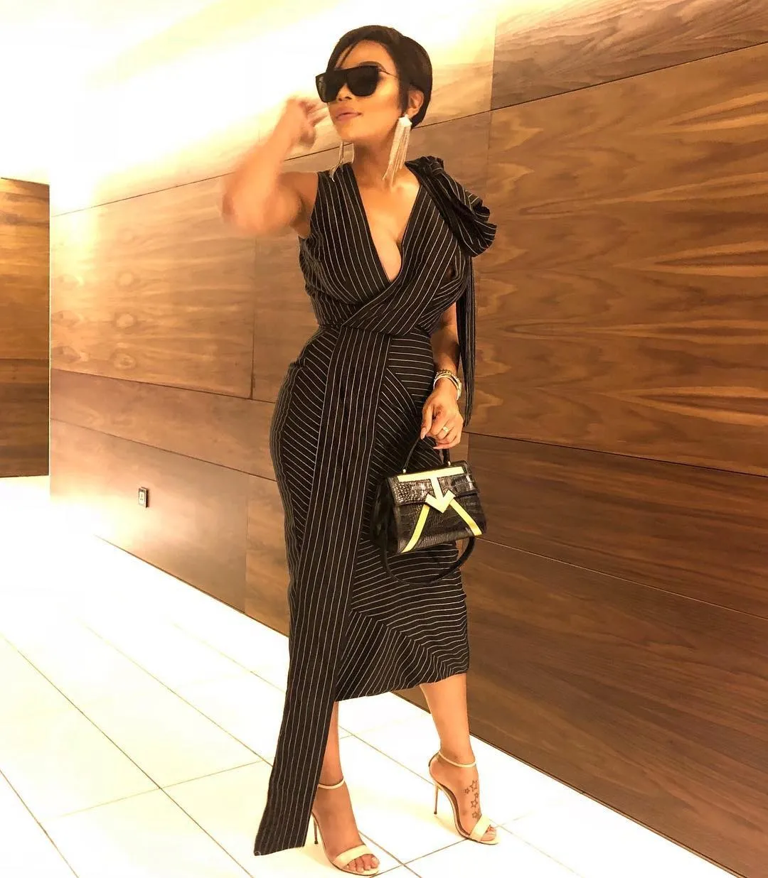 Outfit Of The Day: Bonang Matheba Looks Sensational In Pinstripe Dress