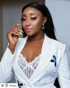 Ini Edo Is Spicy In Embellished White Suit By Julyet Peters